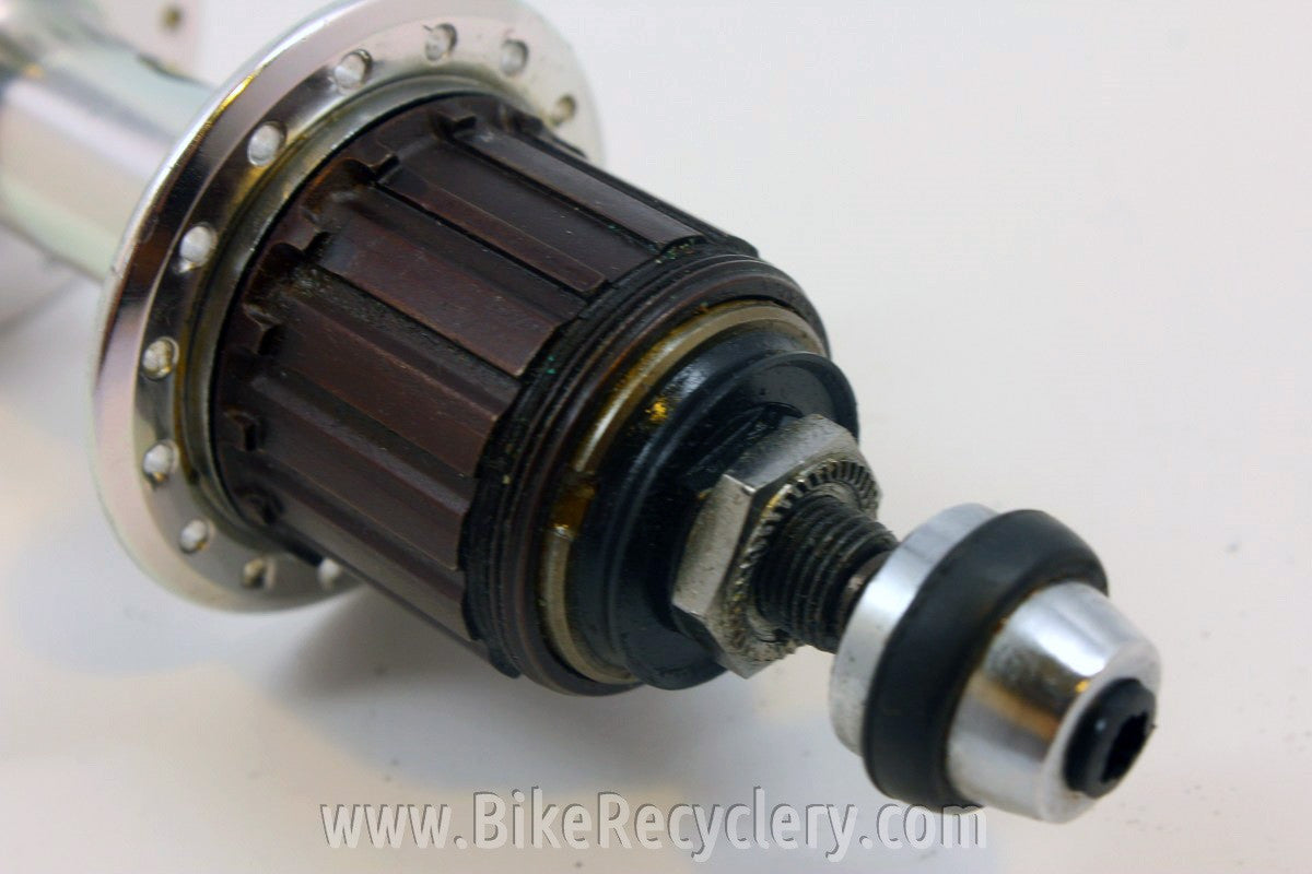 Suntour XC Pro Rear Hub: 7-Speed MicroDrive, WTB Grease Guard 32H NOS Take-Off