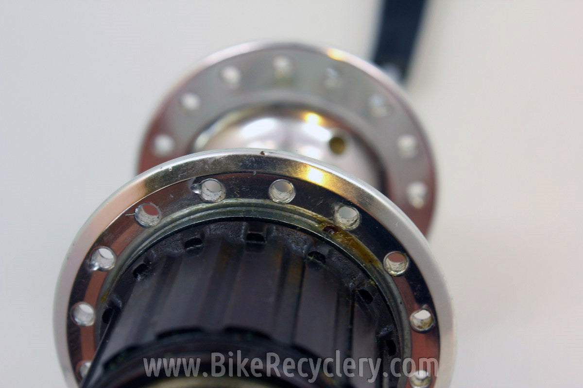 Suntour XC Pro Rear Hub: 7-Speed MicroDrive, WTB Grease Guard 32H NOS Take-Off