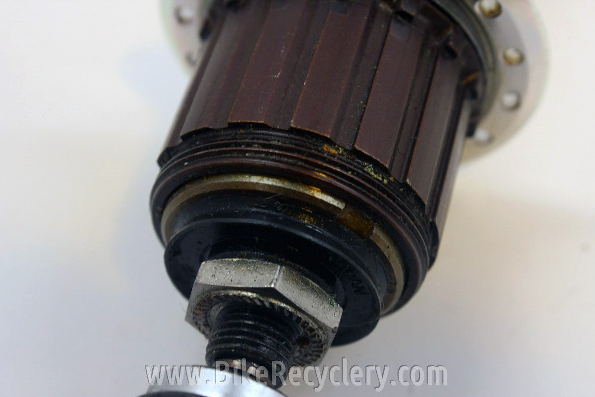 Suntour XC Pro Rear Hub: 7-Speed MicroDrive, WTB Grease Guard 32H NOS Take-Off