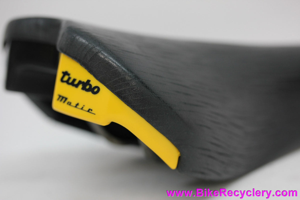 NIB/NOS Selle Italia Turbo-Matic Saddle: 1991 Vintage - Black Textured Leather - Yellow/Black Accents (Take-off)