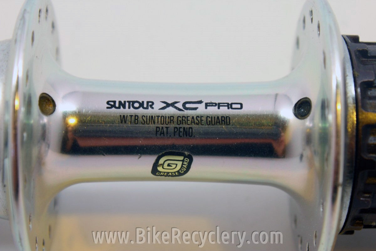 Suntour XC Pro Rear Hub: 7-Speed MicroDrive, WTB Grease Guard 32H NOS Take-Off