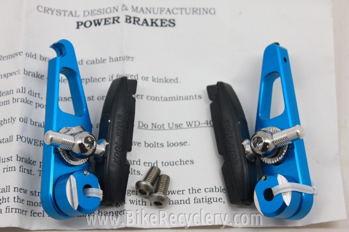 NOS/NIB Crystal Design Power Brakes Set: Blue Anodized