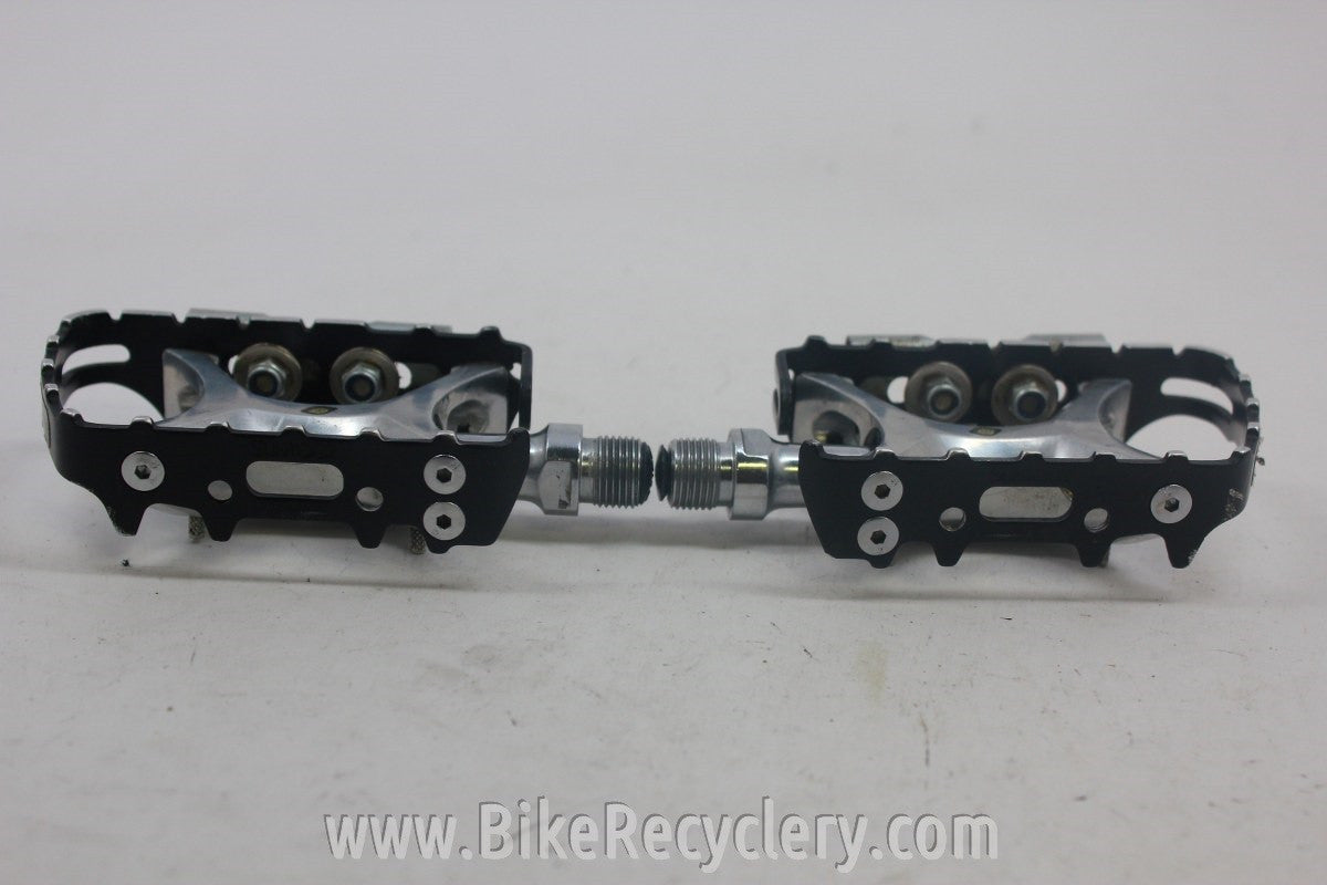 Suntour XC Pro Pedals w/ WTB Toe Flips: WTB Grease Guard, Black, Axle Plugs EXC
