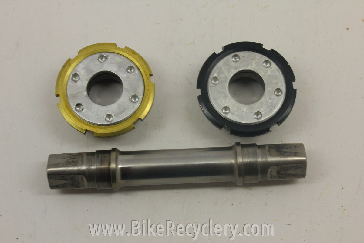 1990's Titanium Square Taper Bottom Bracket: Black/Gold, 111mm x 68mm 135g