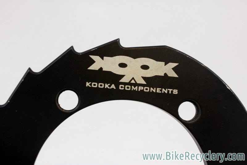 Kooka Crankcase Sawtooth Bash Guard: 36t, 110mm 5-Bolt, Black Anodized, 1990's