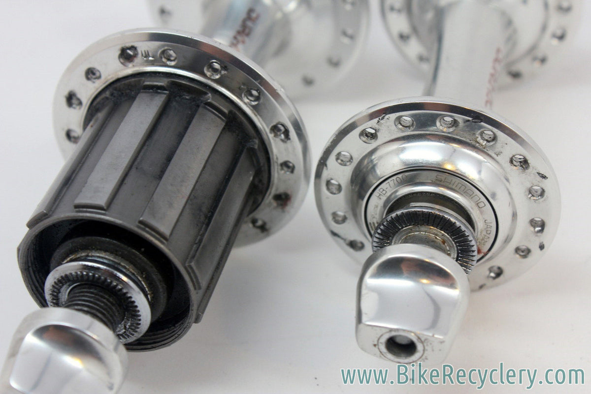 Shimano Dura Ace 9-Speed 7700 Groupset: NM 32H Hubs / QR, STI Shifters, Brakes, Derailleurs, 12-25T Cassette, Cable Stops