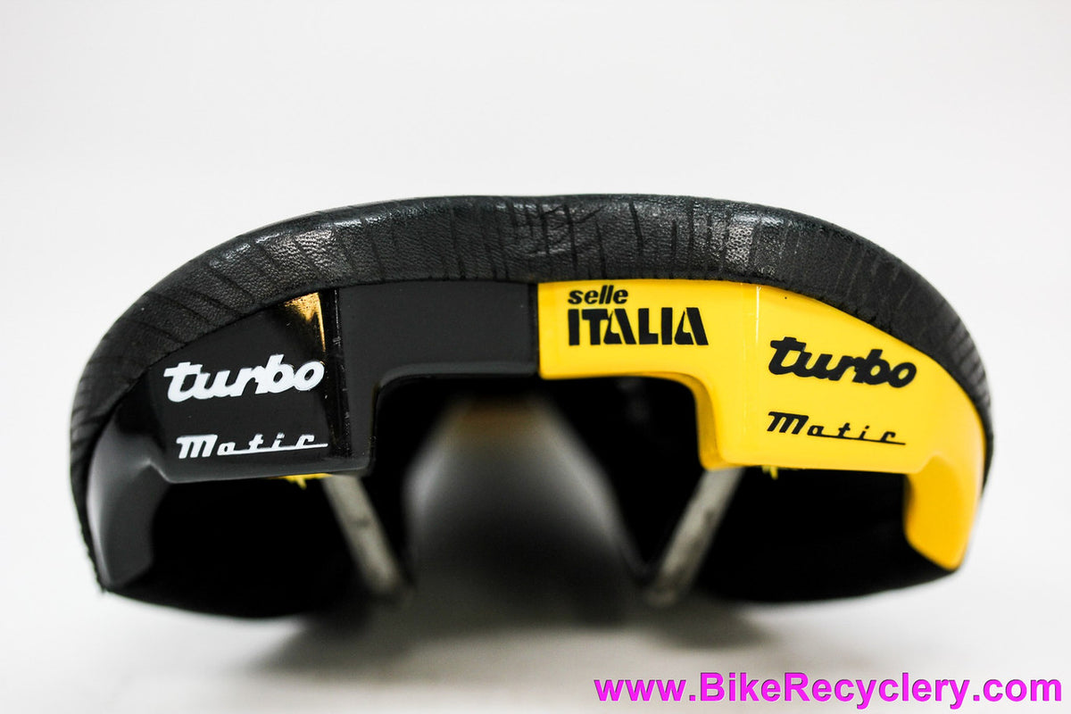 NIB/NOS Selle Italia Turbo-Matic Saddle: 1991 Vintage - Black Textured Leather - Yellow/Black Accents (Take-off)