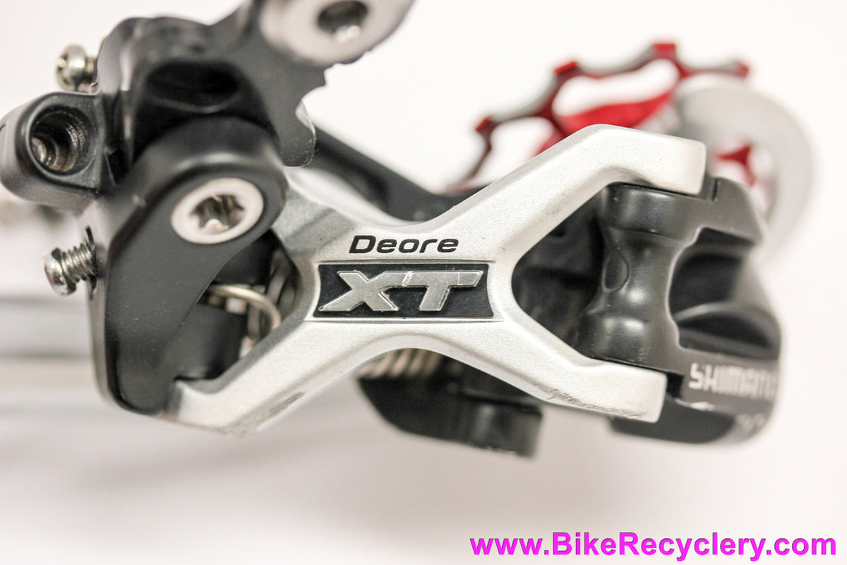 Shimano XT RD-M772 SGS 9 Speed Rear Derailleur: Omni Ti-Ceramic Jockey Wheels (Red) Long Cage (LOW MILES)