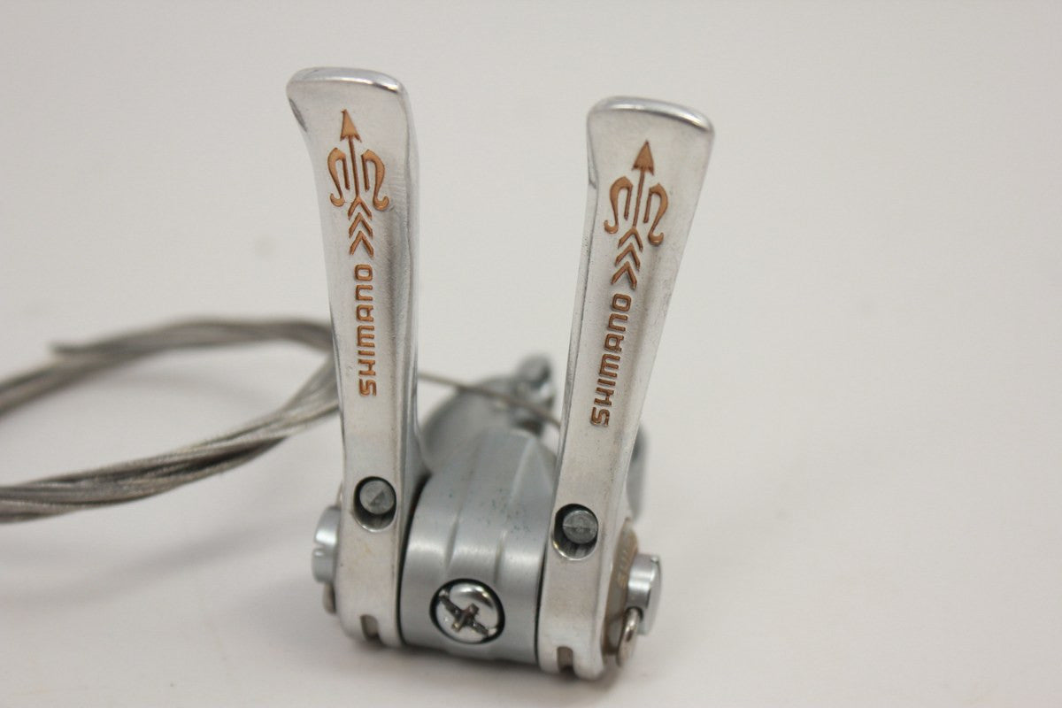 NOS Shimano 105 Golden Arrow Downtube Shifters: SL-A105, Clamp-on, w/Cable Clips & Cables