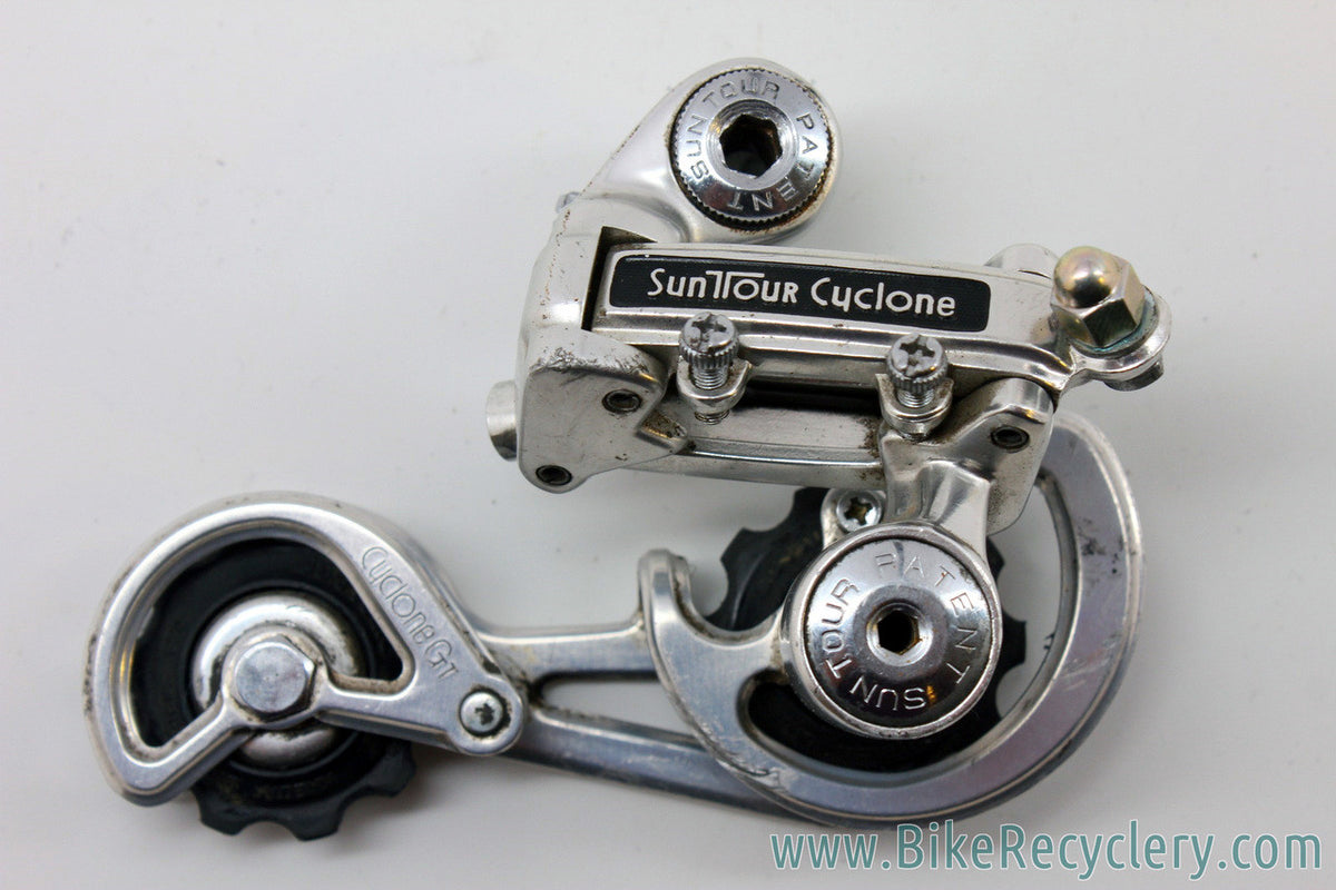 Suntour Cyclone GT Touring Rear Derailleur: Mid Cage - 1st Gen - Silver
