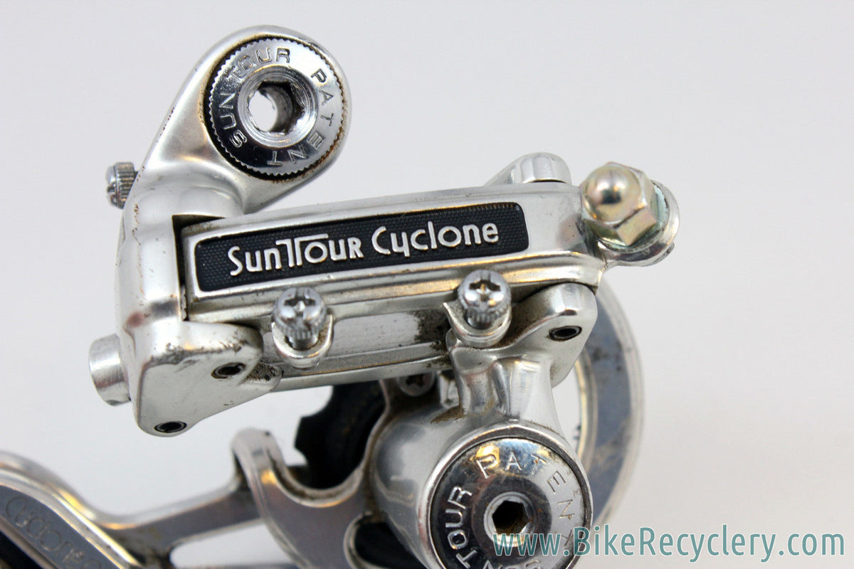 Suntour Cyclone GT Touring Rear Derailleur: Mid Cage - 1st Gen - Silver