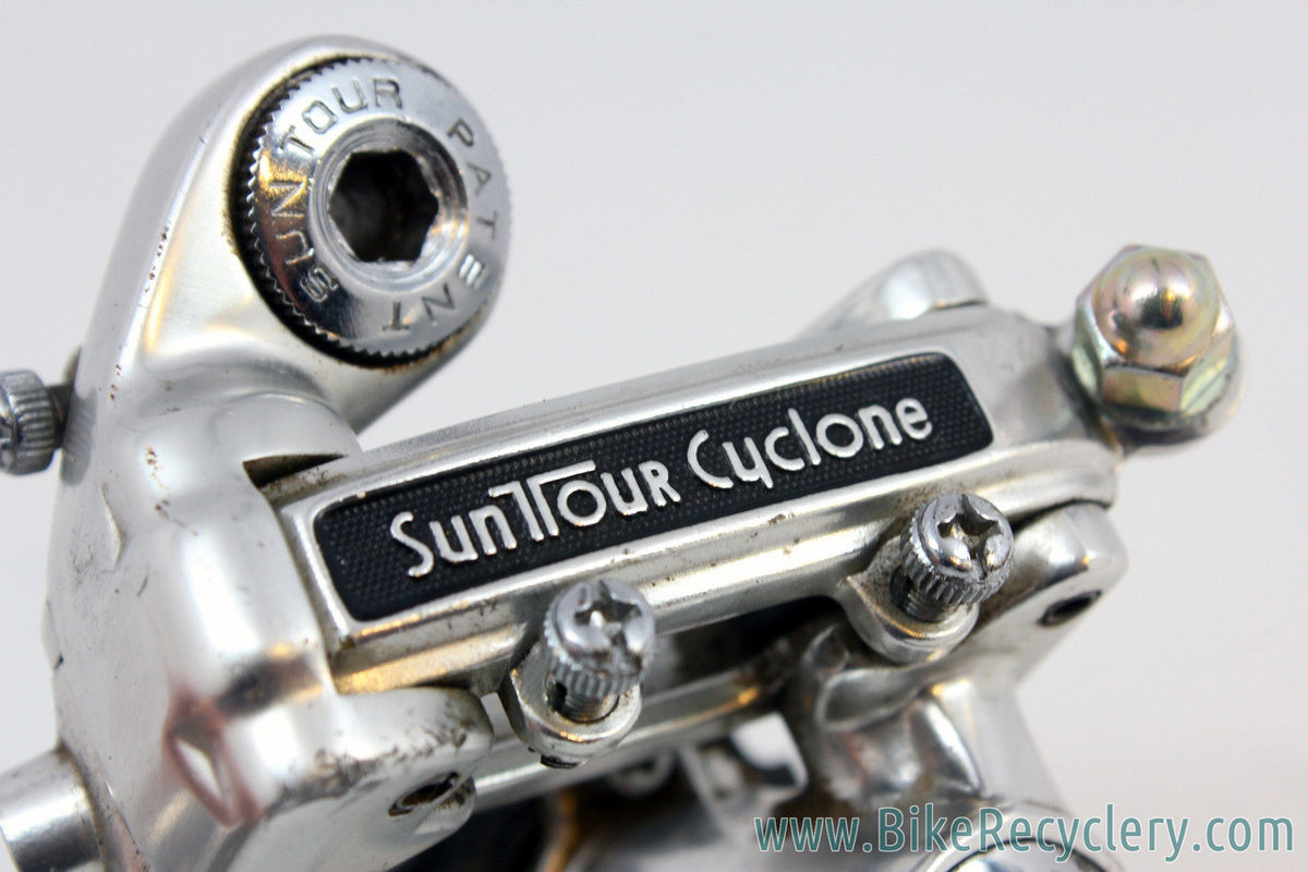 Suntour Cyclone GT Touring Rear Derailleur: Mid Cage - 1st Gen - Silver