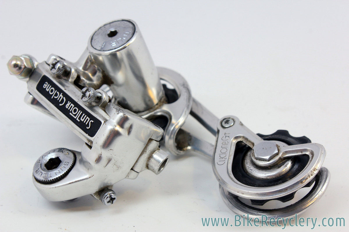 Suntour Cyclone GT Touring Rear Derailleur: Mid Cage - 1st Gen - Silver